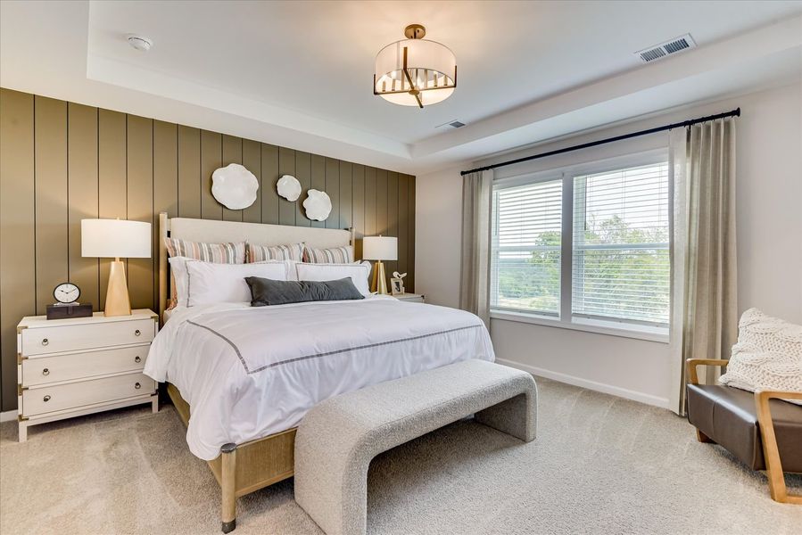 Relax and recharge in a spacious primary suite designed for you