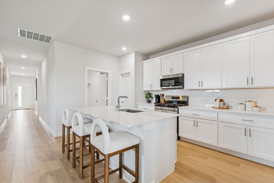Kitchen in a Terra Vella Hayden Model Home in Fort Worth TX by Trophy Signature Homes
