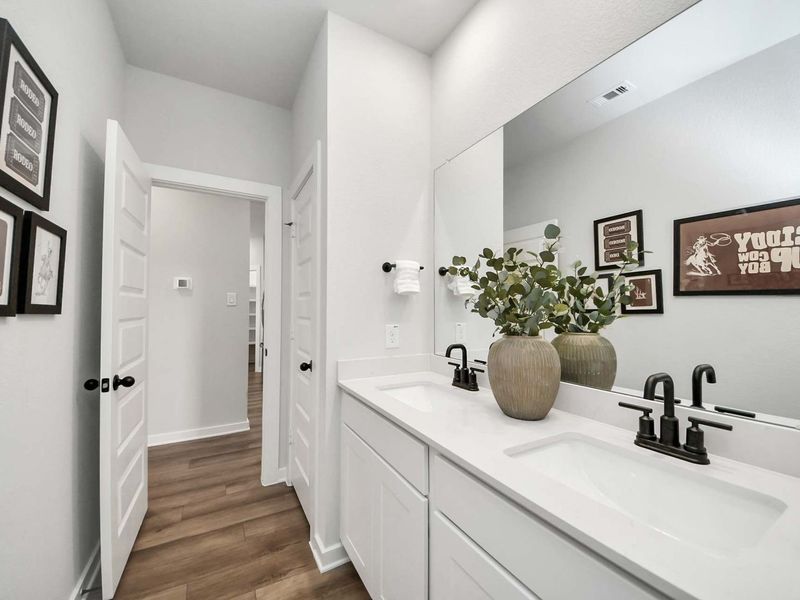 Furnished interior in a model home at Enclave at Newport in Crosby (Image 20).