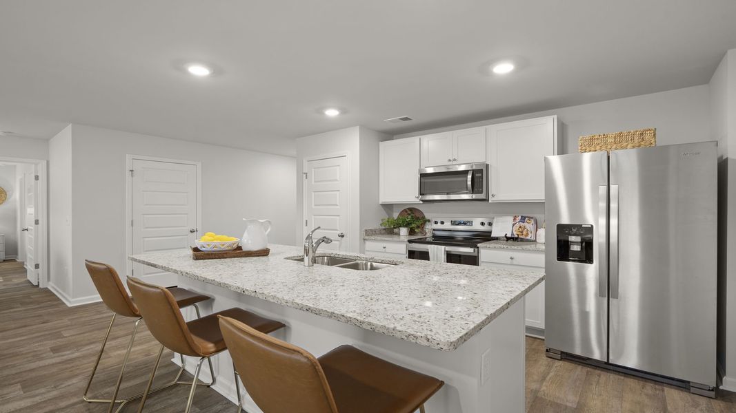 Furnished interior in a model home at The Groves at Bees Creek in Ridgeland (Image 15).