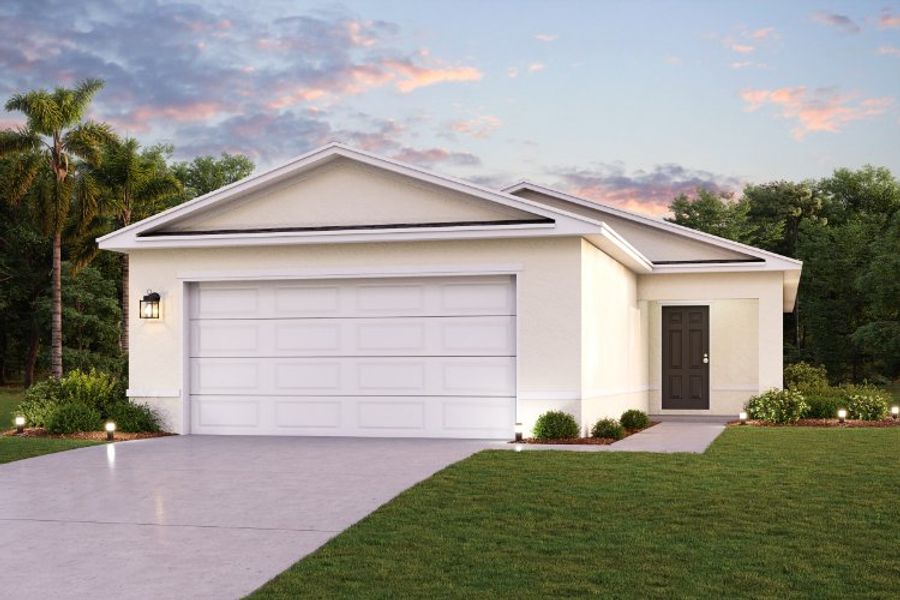 A white house with a driveway.