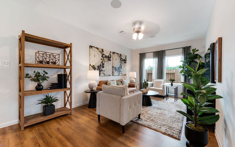 Furnished interior in a model home at The Pines at Seven Coves in Willis (Image 7).