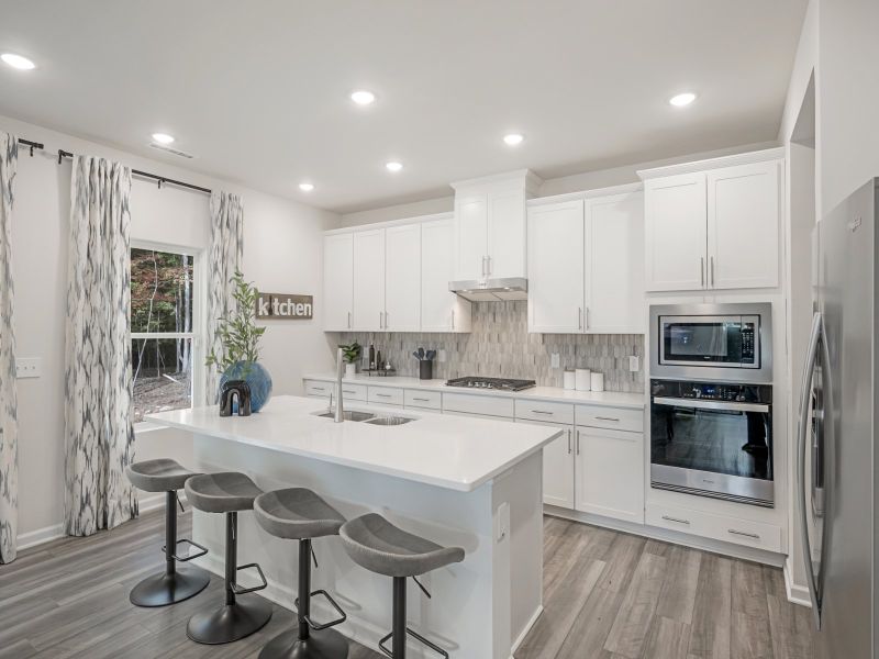 The oversized kitchen island makes it easy to unlock your inner chef.