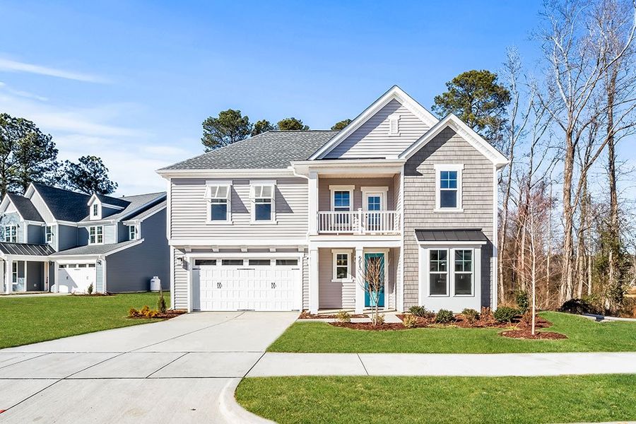 Front exterior of a home in the WyndWater community, located in Hampstead, NC (Image 10).