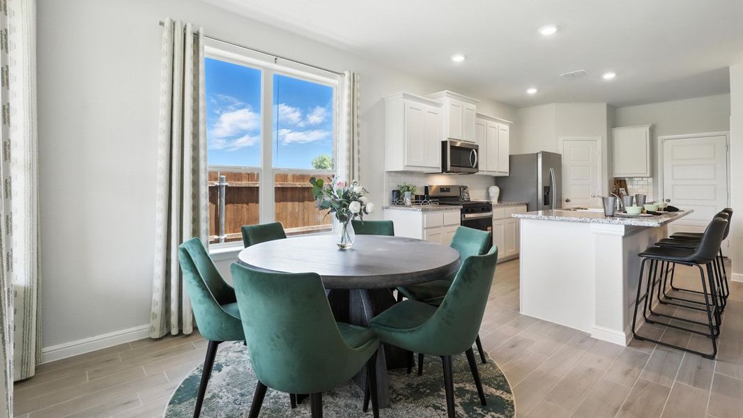 Furnished interior in a model home at The Canyons in Keene (Image 10).