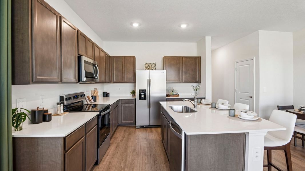Furnished interior in a model home at Sanctuary at Citrus Park Townhomes in Tampa (Image 7).