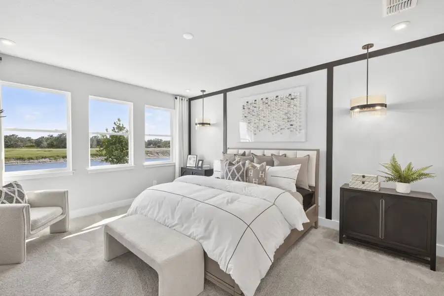 Furnished interior in a model home at Sun Bay Townes in Tampa (Image 9).