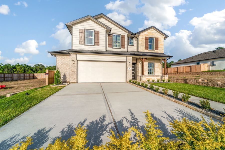 Front exterior of a home in the The Reserve at Huntsville community, located in Huntsville, TX (Image 2).