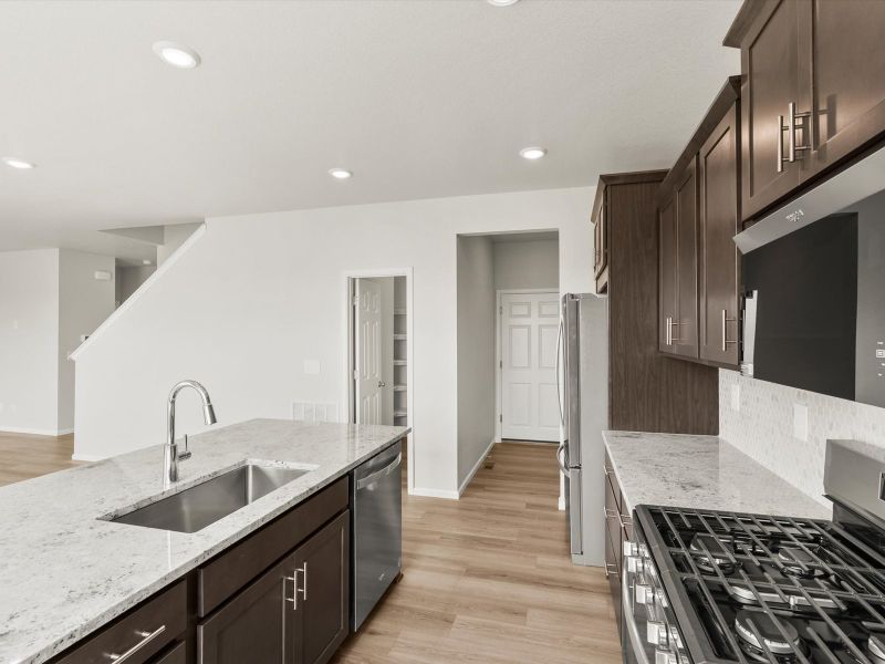 Furnished interior in a model home at Buffalo Highlands: The Canyon Collection in Commerce City (Image 6). Furnished interior in a model home at Buffalo Highlands: The Canyon Collection in Commerce City (Image 6).