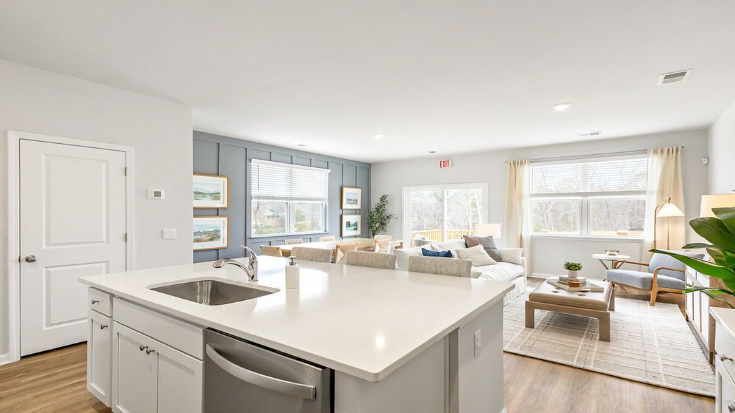 Furnished interior in a model home at The Crossing at St. James in Summerville (Image 4).