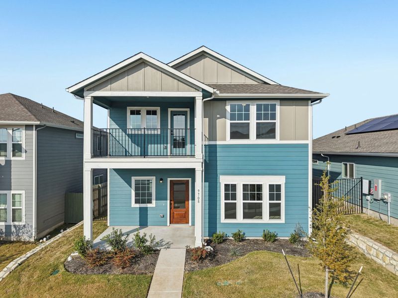 Front exterior of a home in the Whisper Valley community, located in Manor, TX (Image 4).