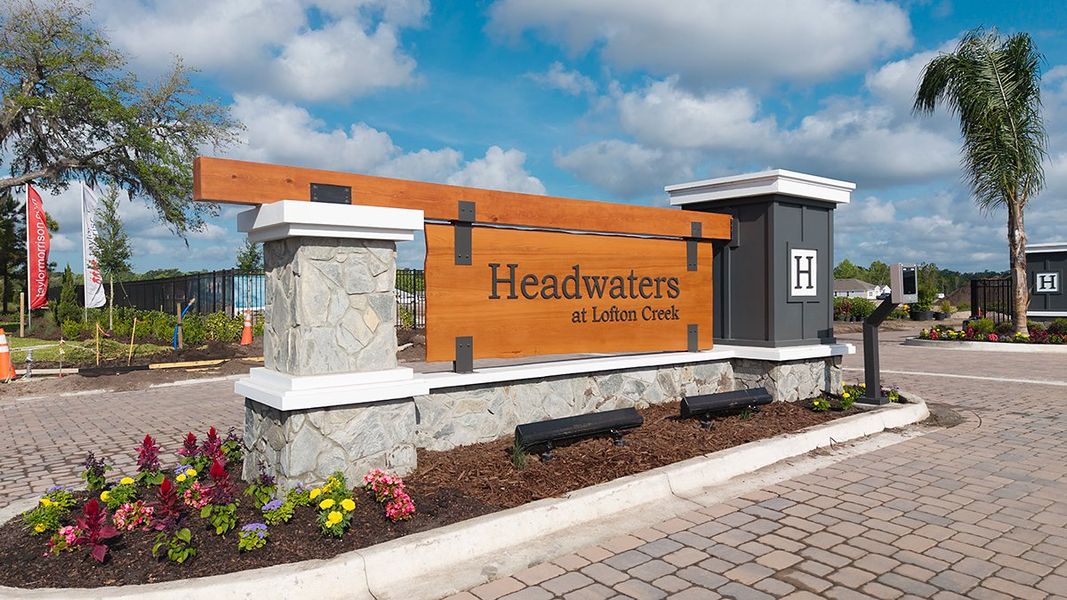 Entrance to the Headwaters at Lofton Creek community in Yulee, FL, featuring signage and landscaping (Image 1). Entrance to the Headwaters at Lofton Creek community in Yulee, FL, featuring signage and landscaping (Image 1).