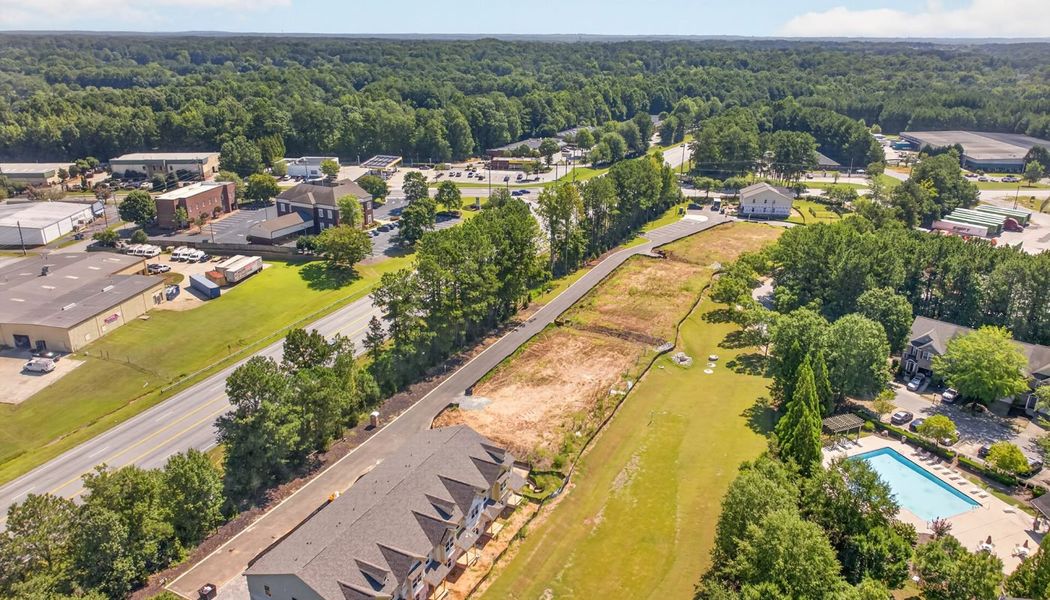 Aerial view of the Carrington Walk community in Powder Springs, GA, showing layout and nearby surroundings (Image 10).
