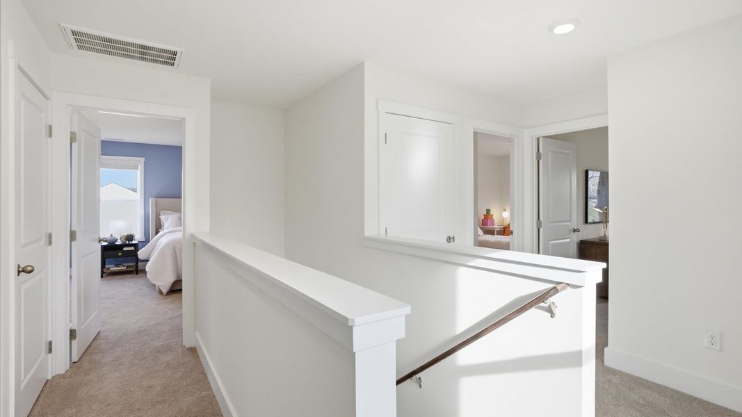 Furnished interior in a model home at Price's Point in Knoxville (Image 24).