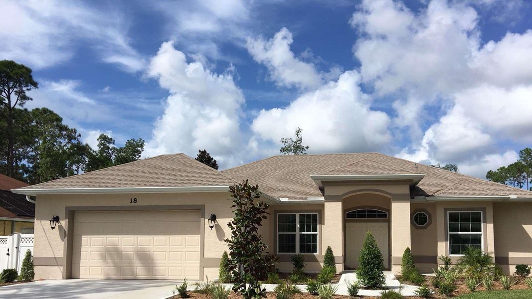 A showcase of a new construction home by Florida Green Construction, highlighting their design and quality (Image 7).