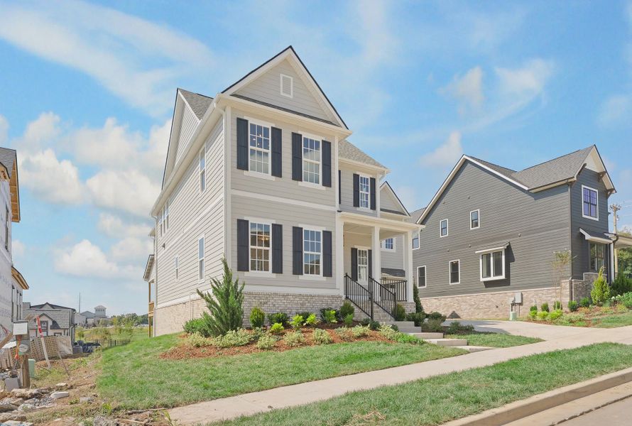 Front exterior of a home in the Poplar Farms community, located in Franklin, TN (Image 9).