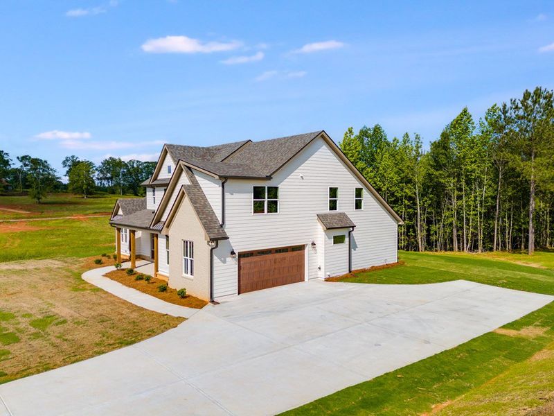 Front exterior of a home in the Harmon Springs community, located in Carrollton, GA (Image 12).