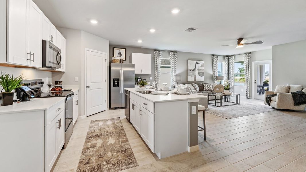 Furnished interior in a model home at Cape Coral Water & Sewer in Cape Coral (Image 37).