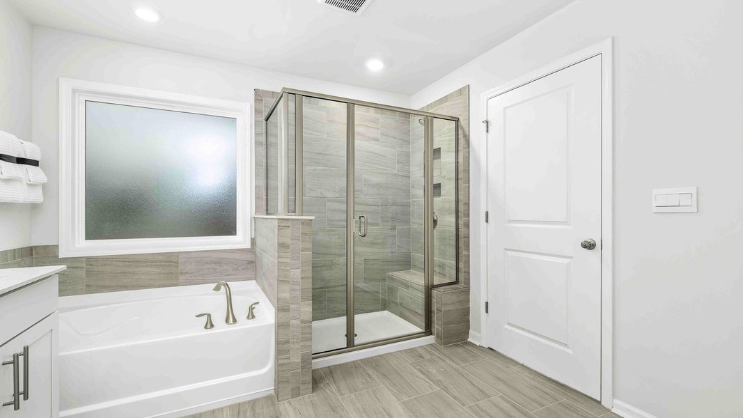 Furnished interior in a model home at Lybrook Village in Bermuda Run (Image 31).