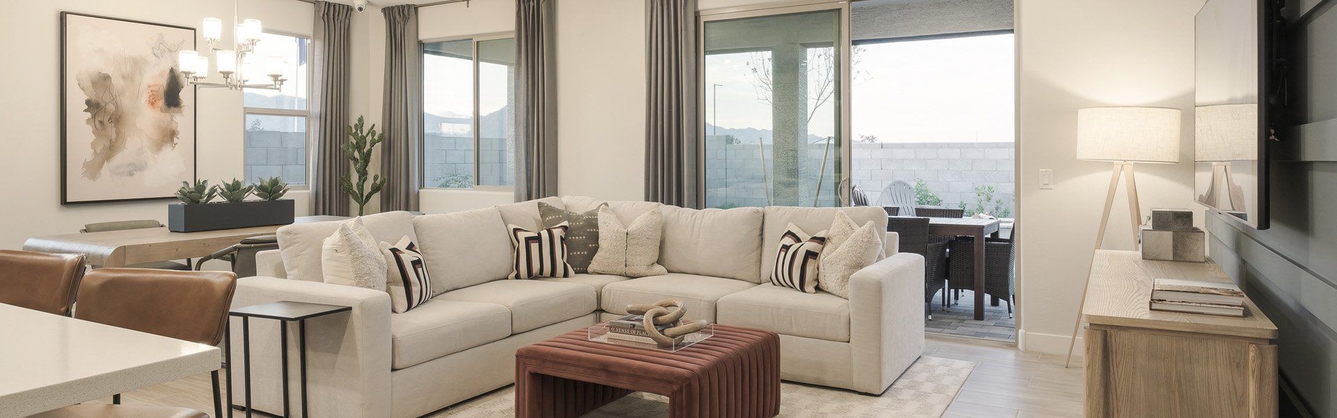 Furnished interior in a model home at Windrose V in Waddell (Image 10).
