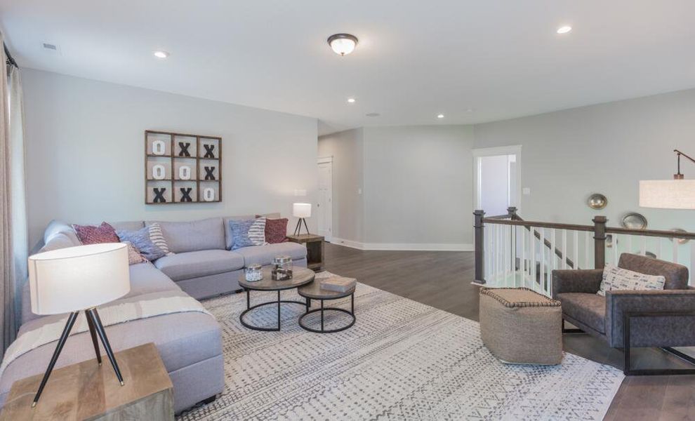 Furnished interior in a model home at Peyton's Creek in Statesville (Image 21).
