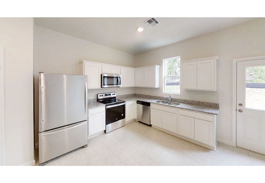 Furnished interior in a model home at Pelham Square in Deland (Image 3). Furnished interior in a model home at Pelham Square in Deland (Image 3).