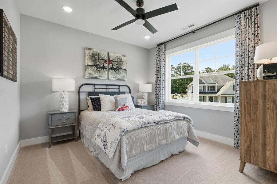 Furnished interior in a model home at Rock Creek in Denver (Image 44).