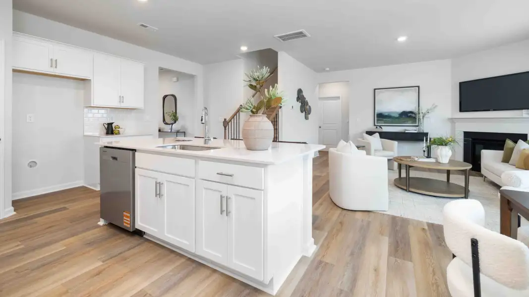 Furnished interior in a model home at Sweetwater Village in Rockwell (Image 8).