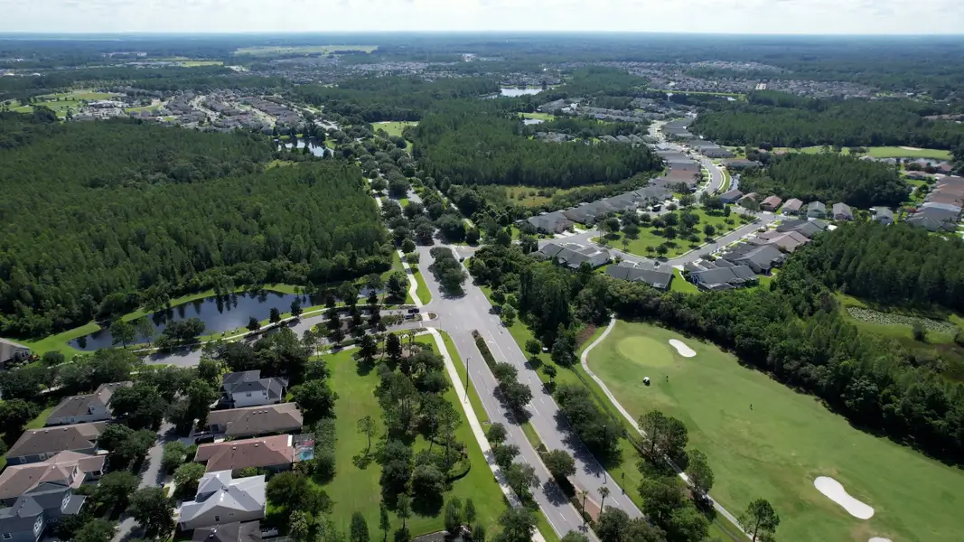 Aerial view of the master-planned community Connerton in Land O' Lakes, FL, highlighting its neighborhoods and green spaces (Image 1). Aerial view of the master-planned community Connerton in Land O' Lakes, FL, highlighting its neighborhoods and green spaces (Image 1).