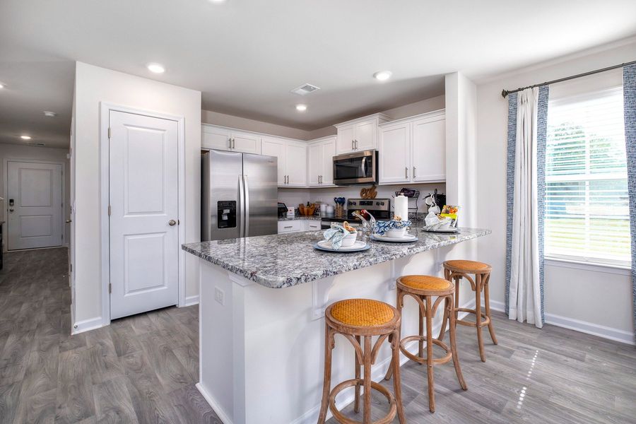 Furnished interior in a model home at Wall Street in Sumter (Image 12).