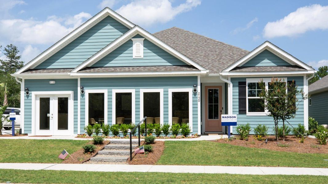 Front exterior of a home in the Indigo Preserve community, located in Leland, NC (Image 8). Front exterior of a home in the Indigo Preserve community, located in Leland, NC (Image 8).