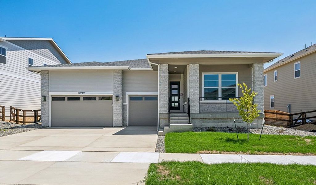 Front exterior of a home in the Barefoot Lakes community, located in Firestone, CO (Image 4).