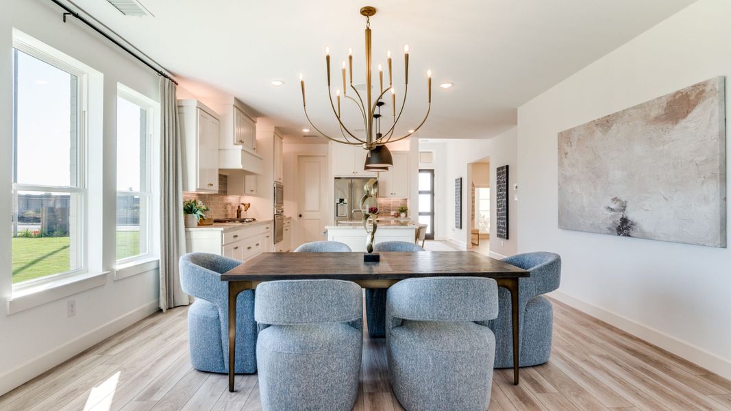 Furnished interior in a model home at Painted Tree - South in McKinney (Image 8).