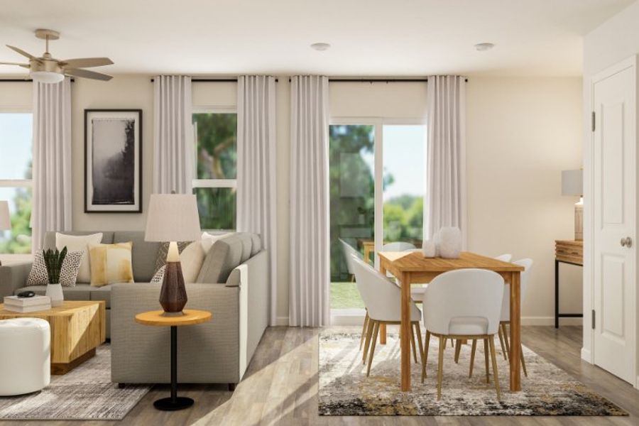 A living room with a table and chairs. A living room with a table and chairs.