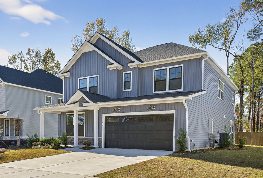 Front exterior of a home in the Huckleberry Estates community, located in Conway, SC (Image 7). Front exterior of a home in the Huckleberry Estates community, located in Conway, SC (Image 7).