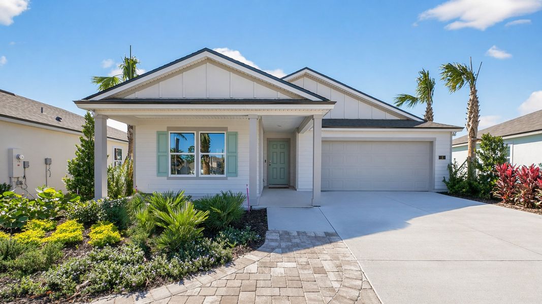 Front exterior of a home in the Sawmill Branch community, located in Palm Coast, FL (Image 4). Front exterior of a home in the Sawmill Branch community, located in Palm Coast, FL (Image 4).