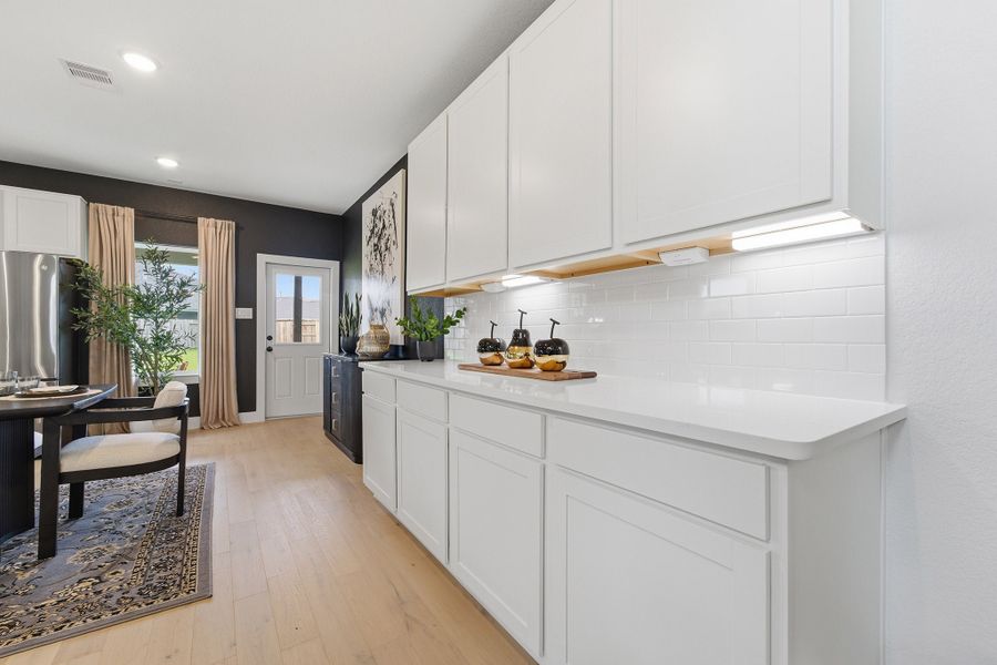 Furnished interior in a model home at Pecan Estates in Crosby (Image 27).