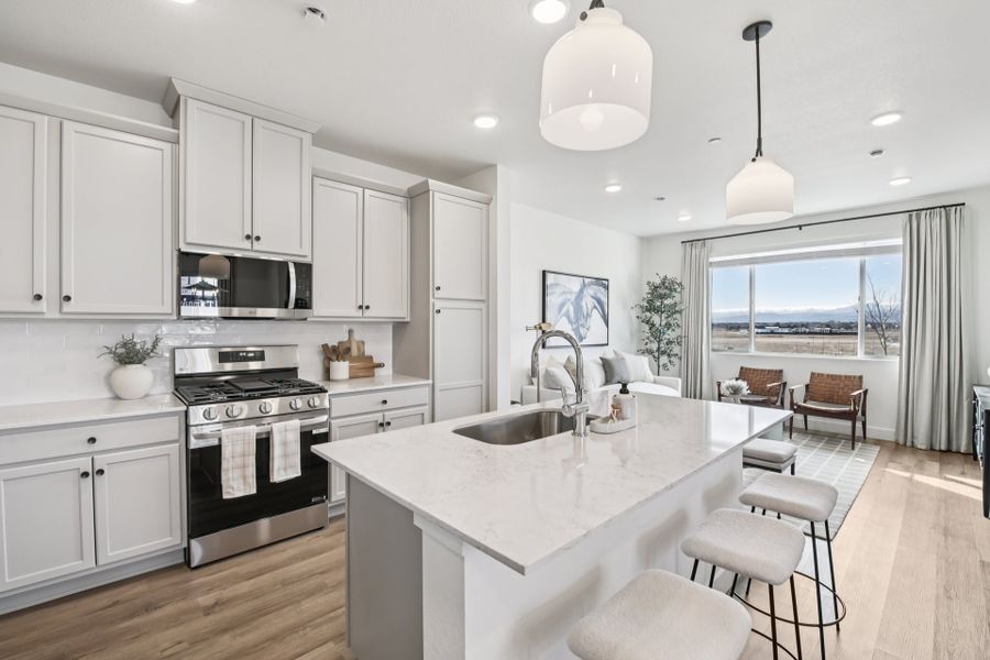 Furnished interior in a model home at Timnath Ranch Townhomes in Timnath (Image 22).