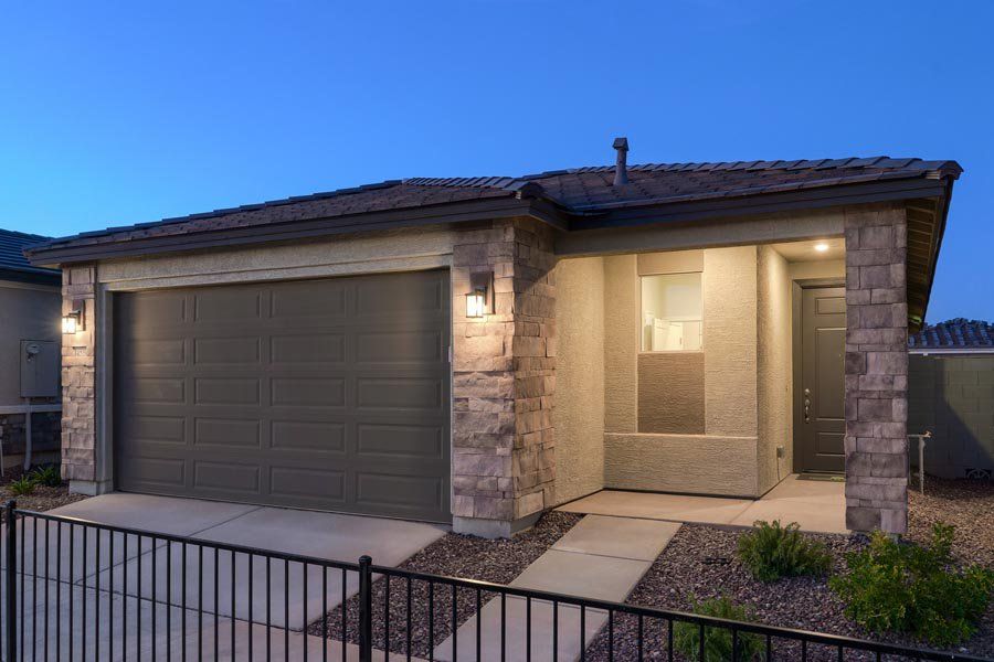Front exterior of a home in the Beacon Hill at Marley Park community, located in Surprise, AZ (Image 15).