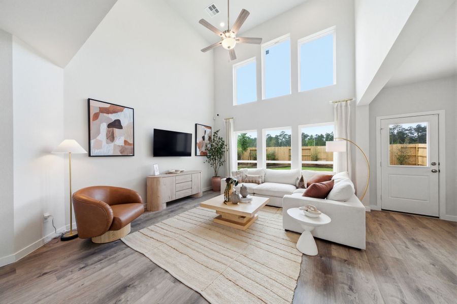 A living room with a large window.