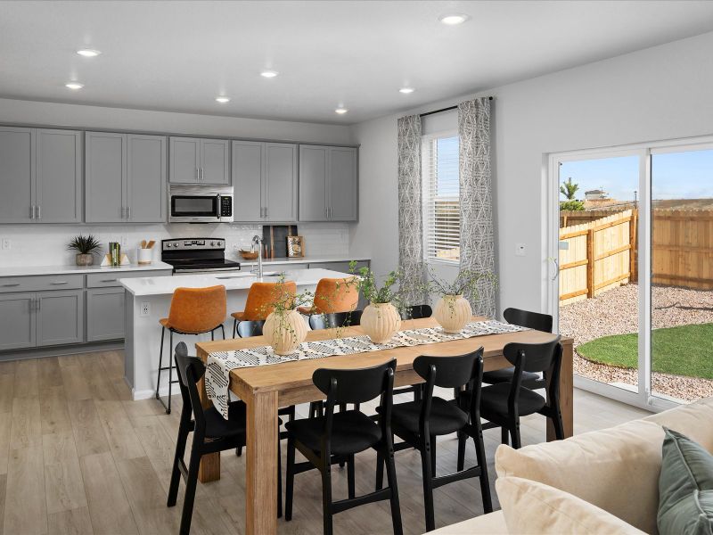 Furnished interior in a model home at Frontier Estates - The Trails Collection in Firestone (Image 5).