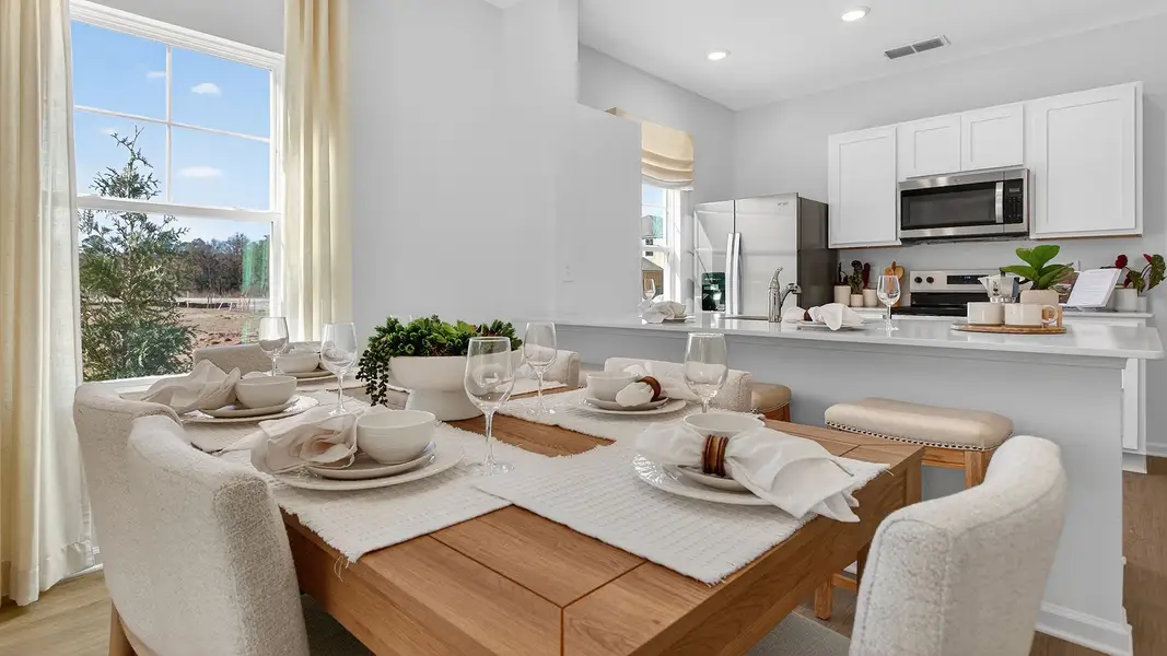 Furnished interior in a model home at Liberty Cove in Yulee (Image 4).