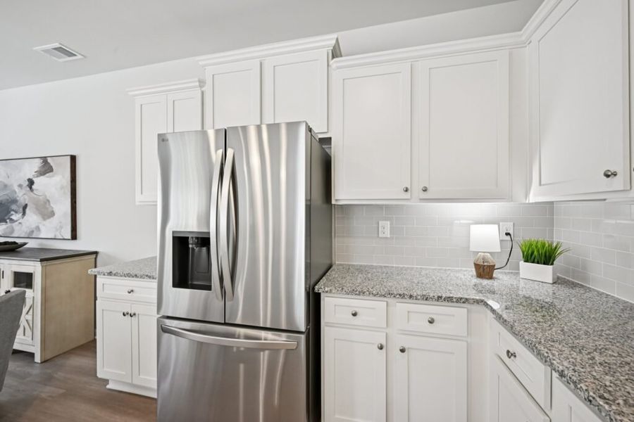 Furnished interior in a model home at Chastain Heights in Woodstock (Image 32).