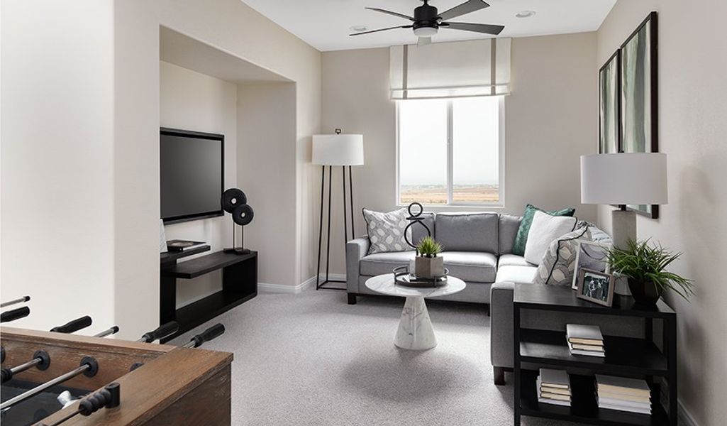 Furnished interior in a model home at Meridian at Star Valley in Tucson (Image 14).