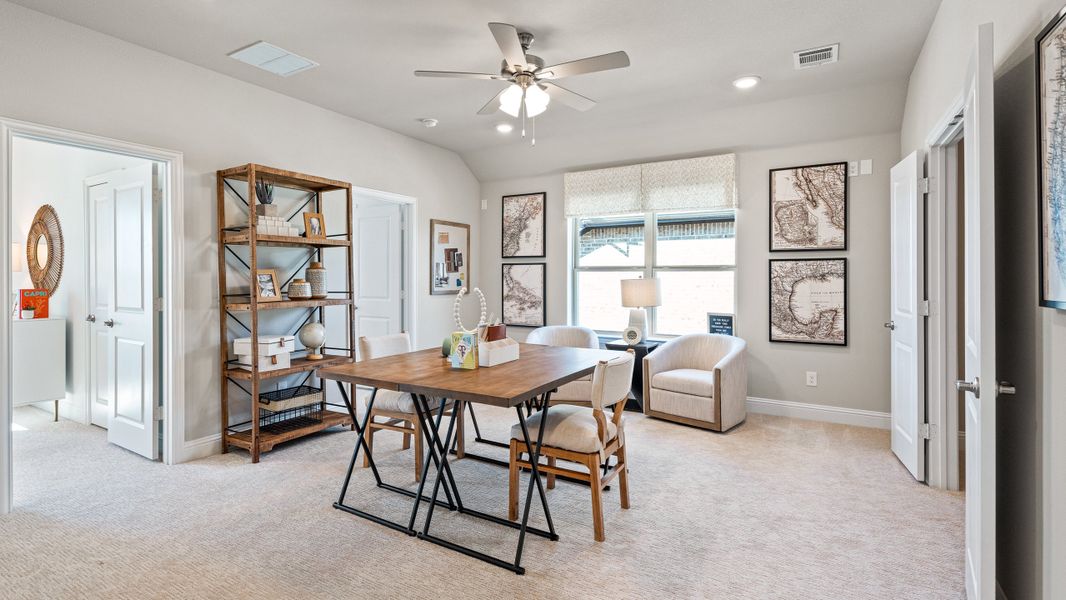 Furnished interior in a model home at Brookville Estates in Forney (Image 12).