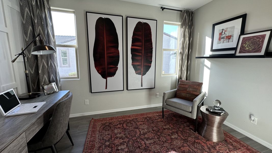 Furnished interior in a model home at CantaMia at Estrella 55+ in Goodyear (Image 33).