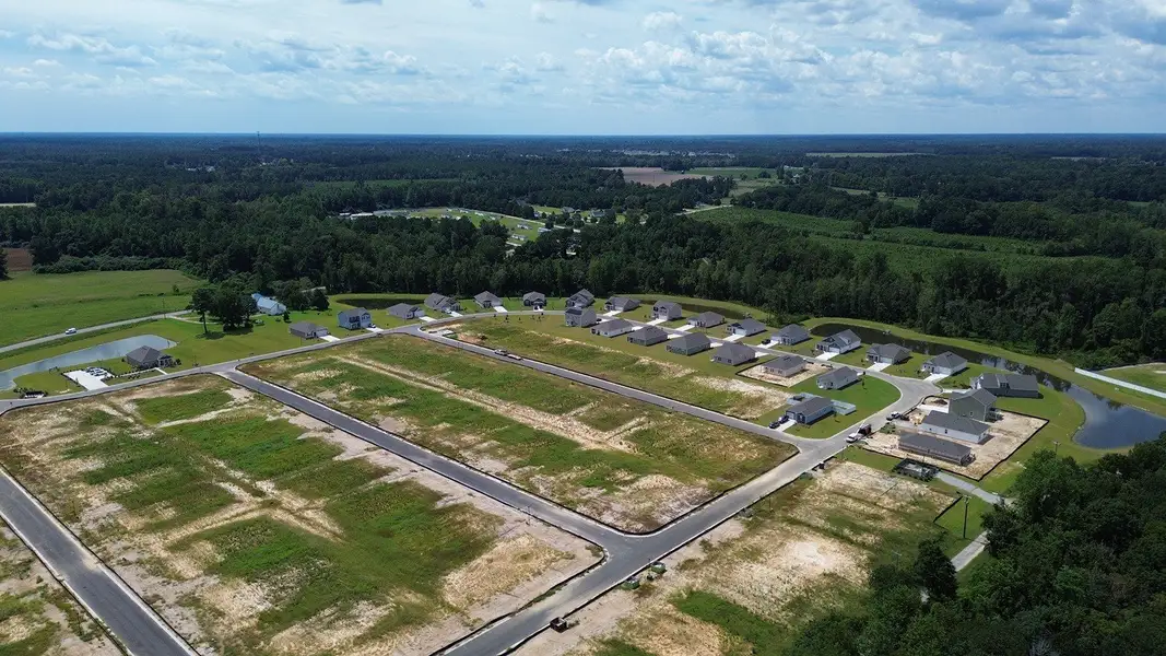 Site preparation and early development at Meadow Walk in Loris, SC (Image 10).