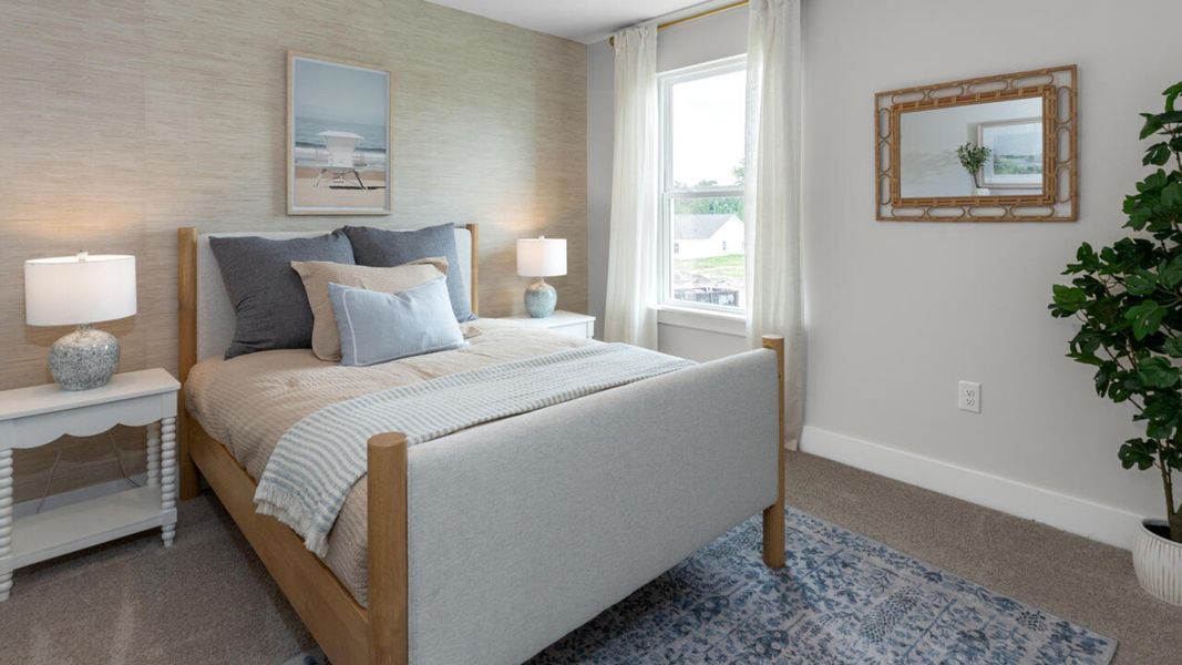 Furnished interior in a model home at Eagle Creek in Bolivia (Image 35).