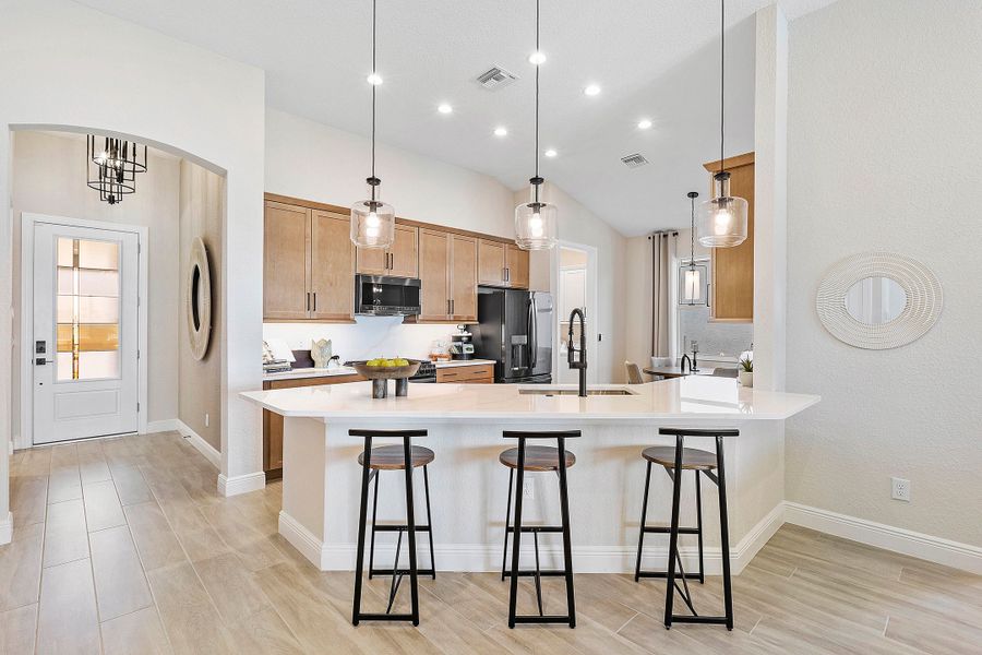 Furnished interior in a model home at The Sanctuary – Resort Collection in Punta Gorda (Image 13).