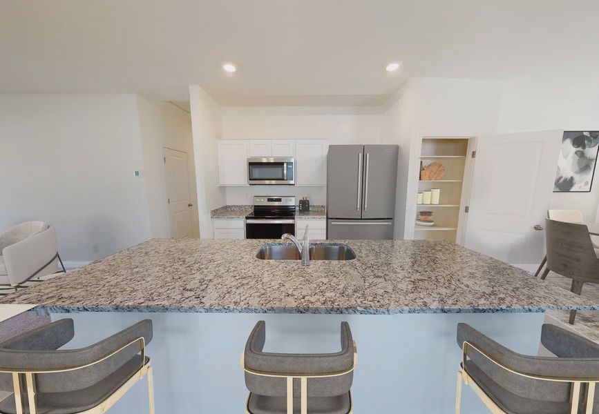 Furnished interior in a model home at Magic Ranch in Florence (Image 6). Furnished interior in a model home at Magic Ranch in Florence (Image 6).